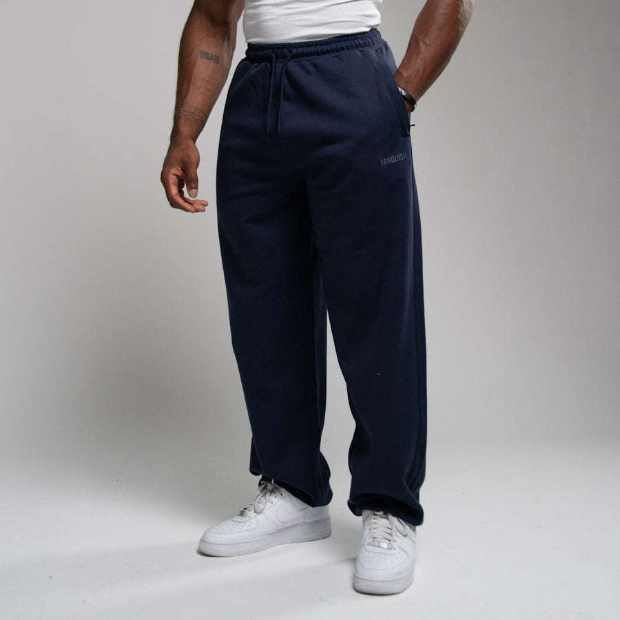 EVOLVE NAVY OVERSIZED CUFFED SWEATPANTS 1枚目の画像