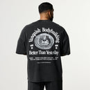 HERITAGE AND STRENGTH BLACK BOXY OVERSIZED T SHIRT 1枚目の画像
