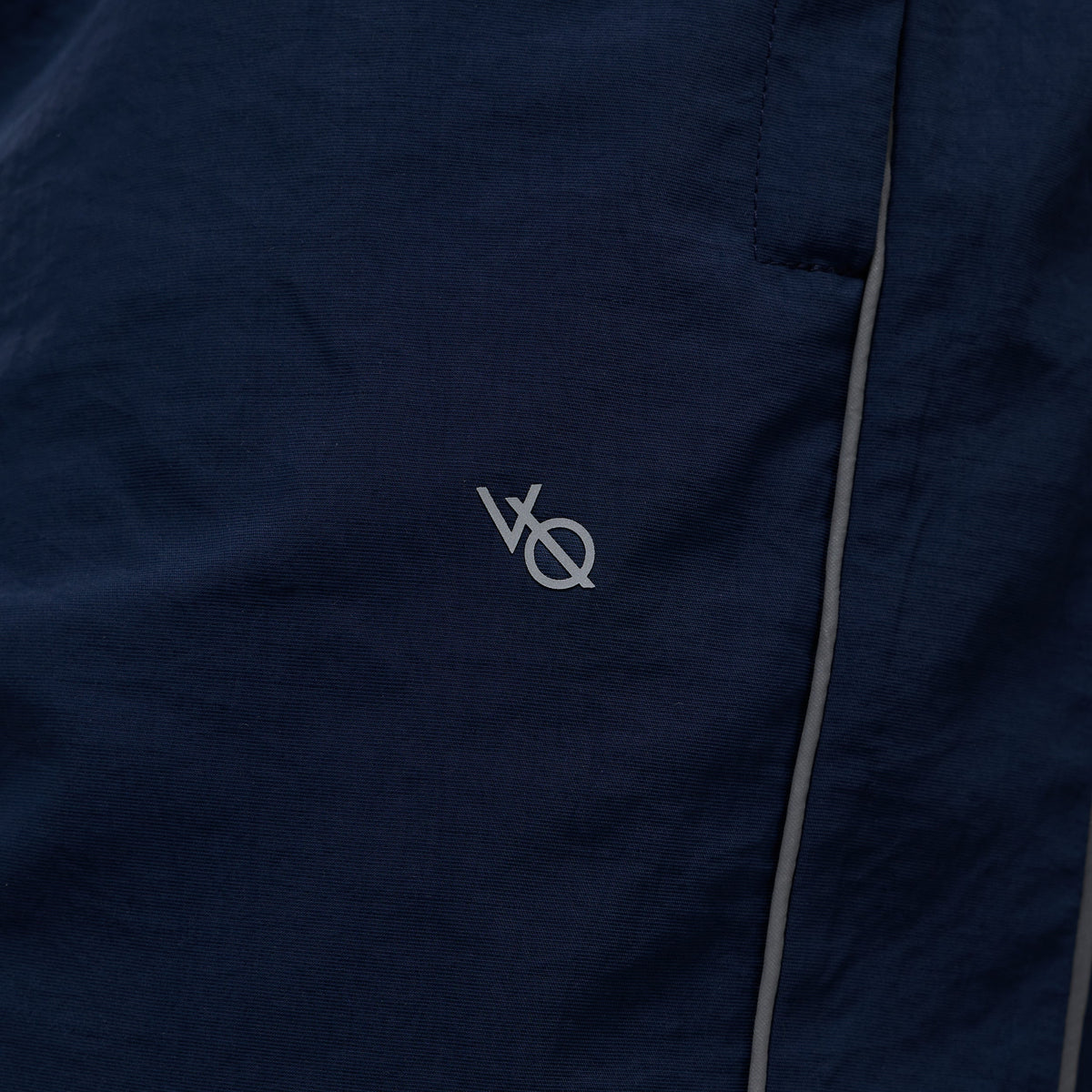 REFLECTIVE NAVY OVERSIZED TRACK PANTS 2枚目の画像