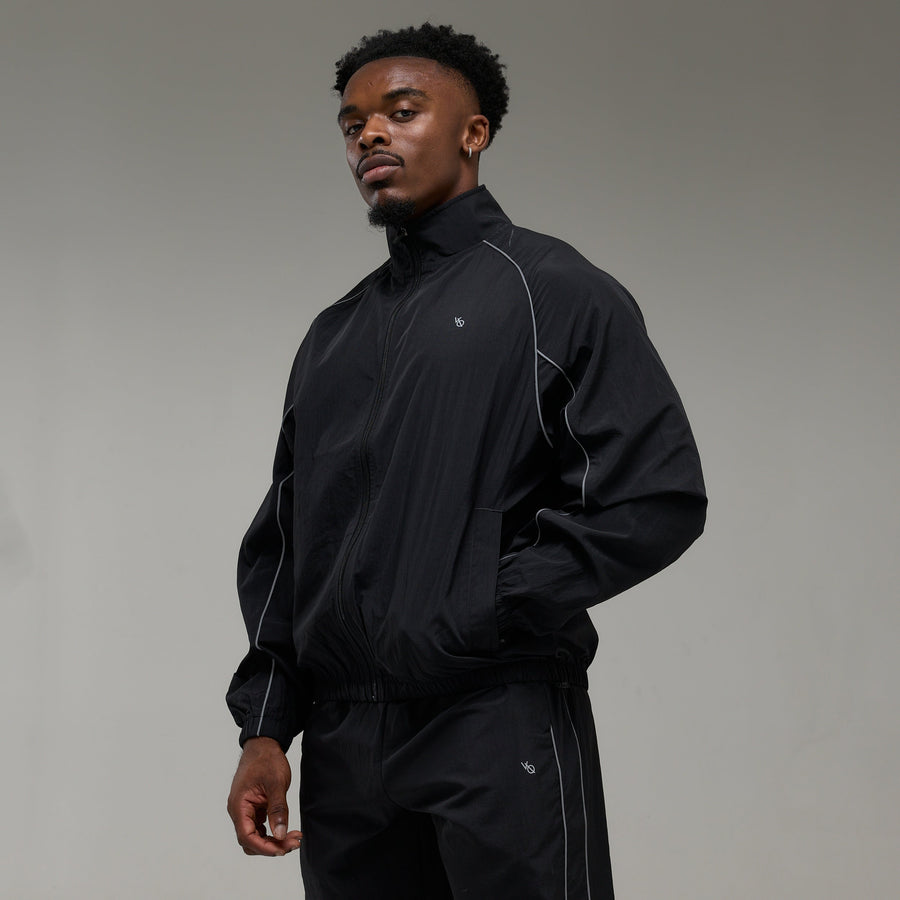 REFLECTIVE BLACK OVERSIZED TRACK JACKET 1枚目の画像